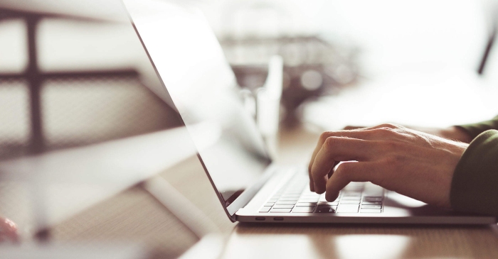 Freelancer spending long hours at laptop